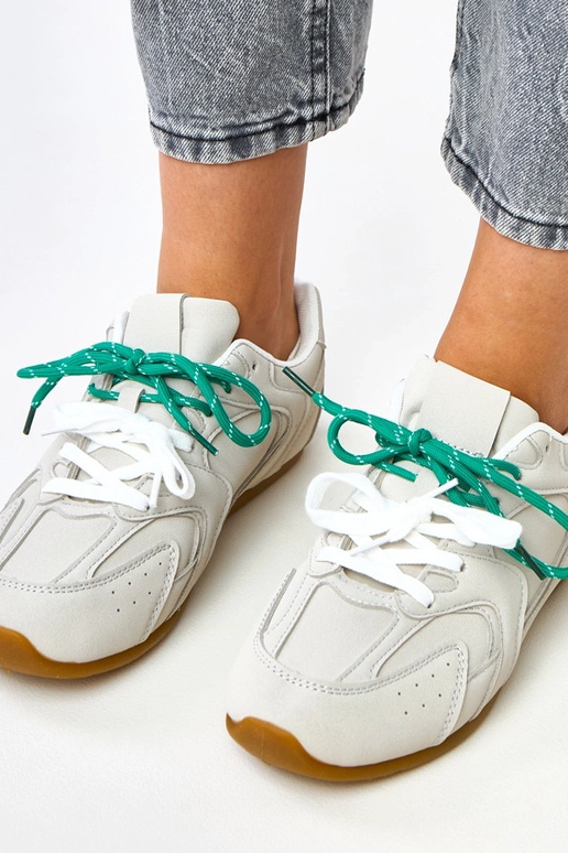 Graue Sportschuhe mit doppelten...