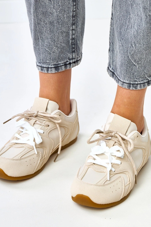 Beige sportieve schoenen met dubbele... Beige sportieve schoenen met dubbele...