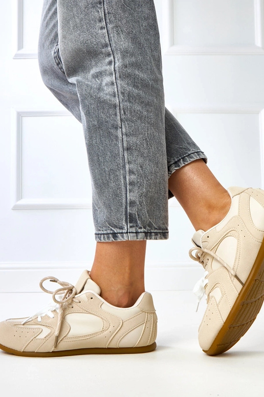 Beige sportieve schoenen met dubbele... Beige sportieve schoenen met dubbele...