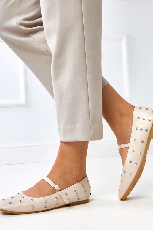 Sandkleurige ballerina's met... Sandkleurige ballerina's met...