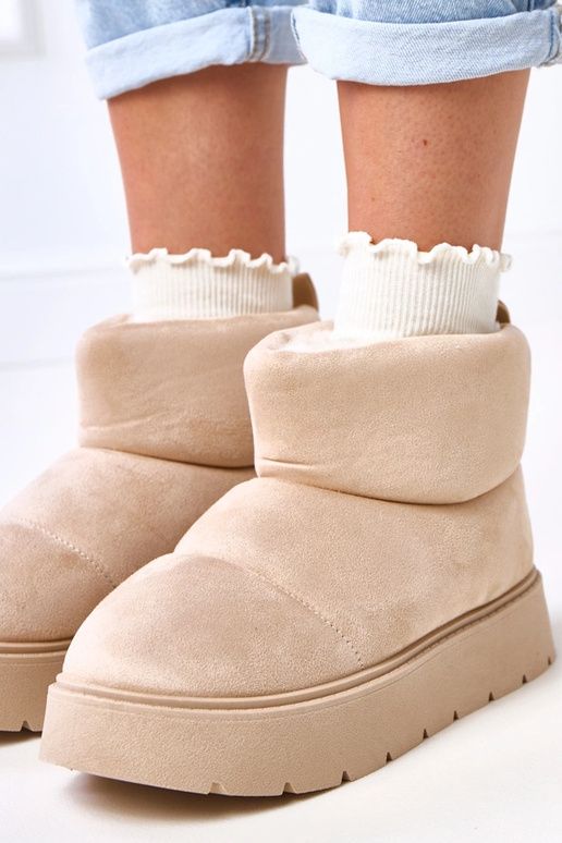 Bottes de neige beiges claires...