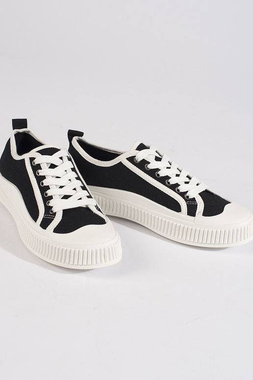 Zwarte dames sneakers met plateau in... Zwarte dames sneakers met plateau in...
