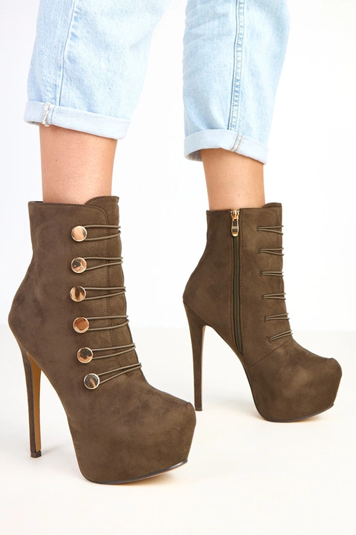 Bottes vertes sur plateforme et talon...