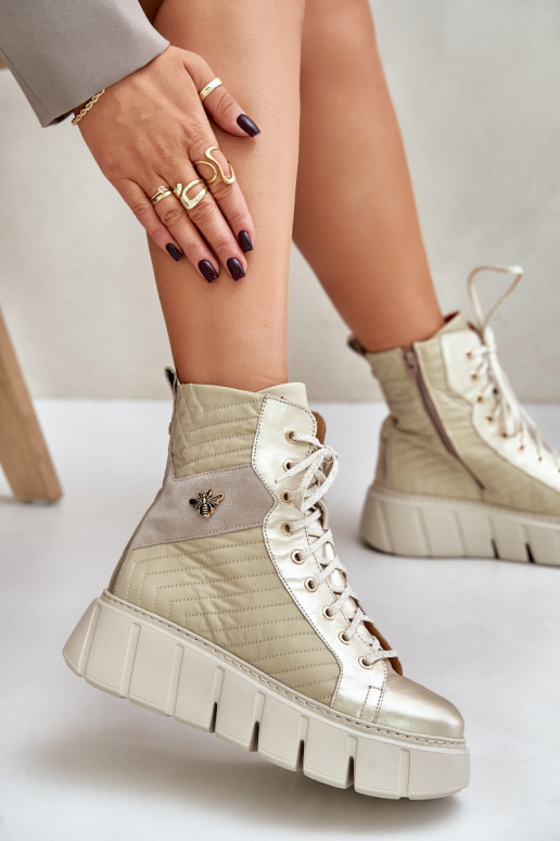 Peau Bottes avec une plateforme Il fautciejka 06751-25 couleur dorée