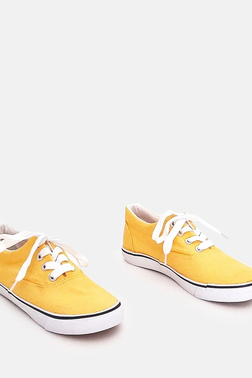 Gele kinder sportschoenen met veters...