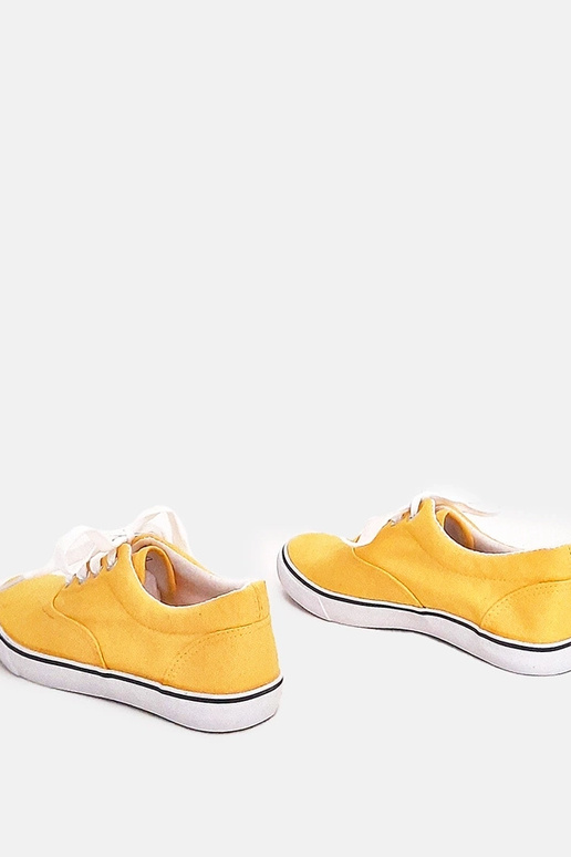 Gele kinder sportschoenen met veters...