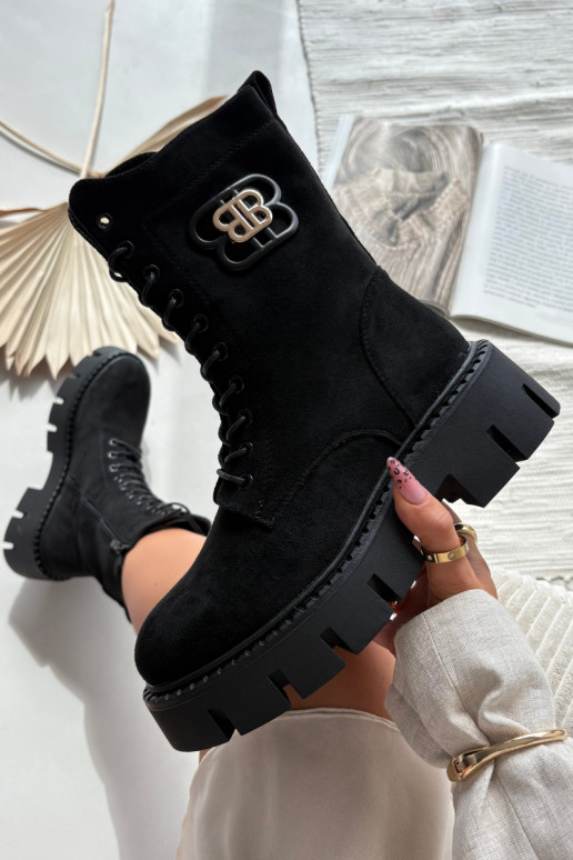 Warm gefütterte Damenstiefeletten und Noker mit Ornamenten in schwarz Melisse