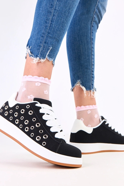 Zwarte sneakers op platform met studs...