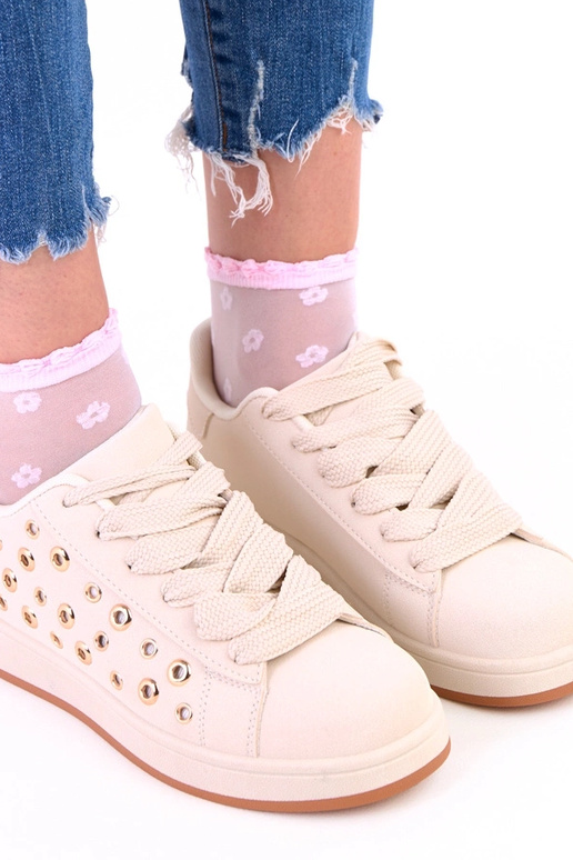 Zandkleurige sneakers op platform met...