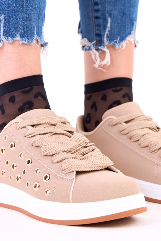 Bruine sportieve schoenen op plateau...