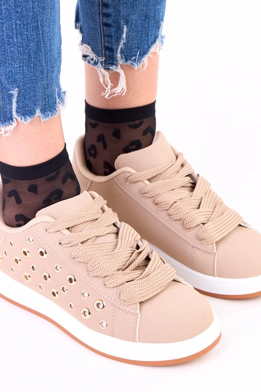 Bruine sportieve schoenen op plateau...