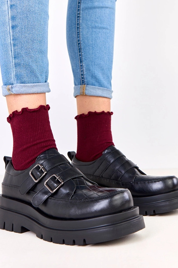 Bottines noires sur semelle...