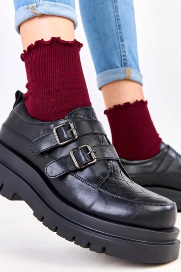 Bottines noires sur semelle... 2