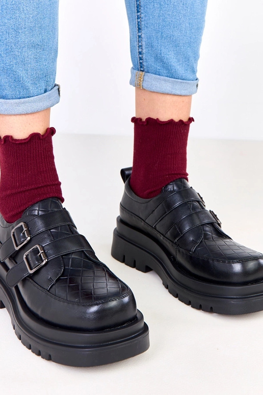 Schwarze Halbstiefel auf massiver...