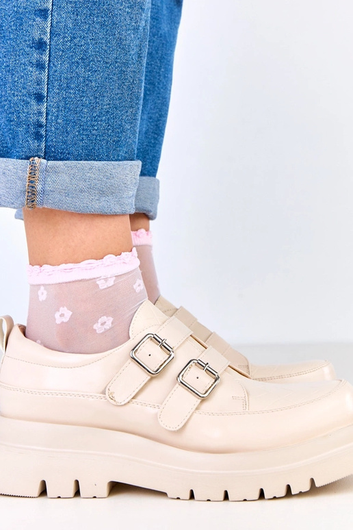 Bottines beiges sur semelle massive,...