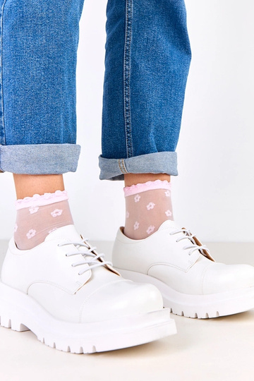 Bottines blanches sur...