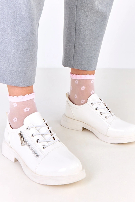 Bottines laquées blanches pour...