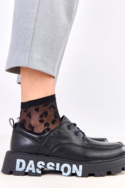 Schwarze Damenhalbschuhe mit Muster...