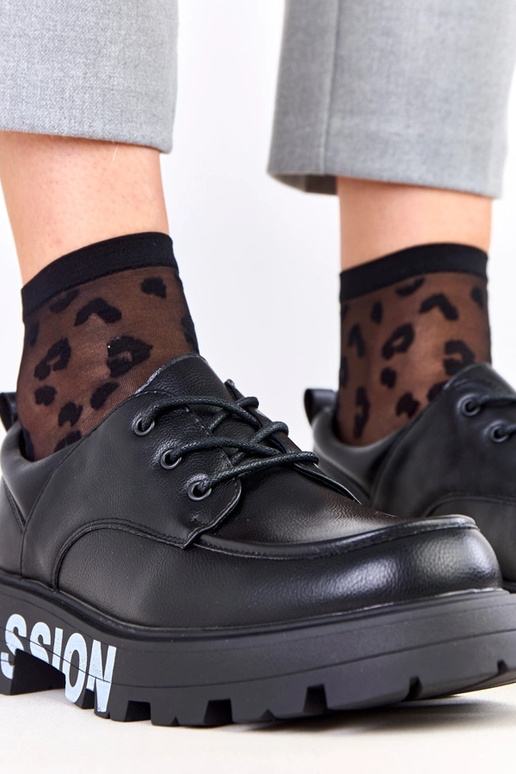 Schwarze Damenhalbschuhe mit Muster...