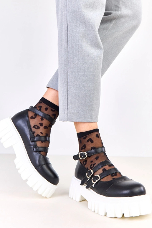 Bottines noires sur semelle de...