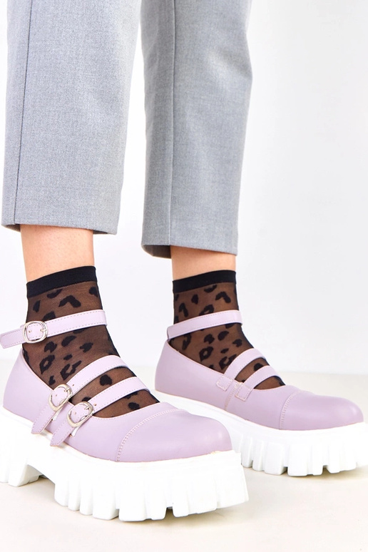 Bottines violettes sur semelle de...