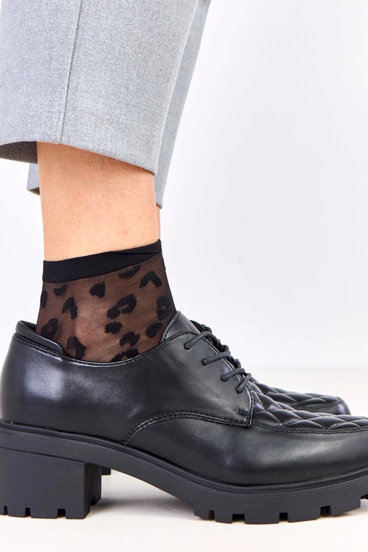 Schwarze Halbschuhe mit gestepptem...