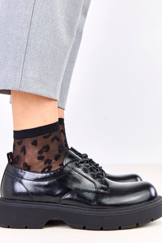 Schwarze Damenhalbschuhe auf...