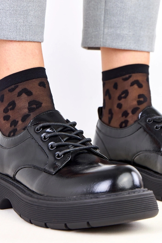 Schwarze Damenhalbschuhe auf...