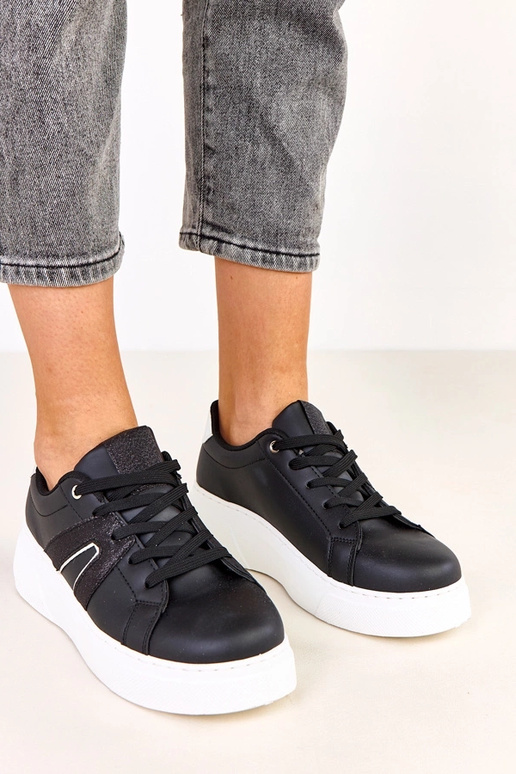 Schwarze Sneakers mit Plattform und...