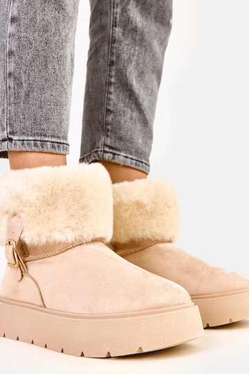 Zandkleurige sneeuwlaarzen...