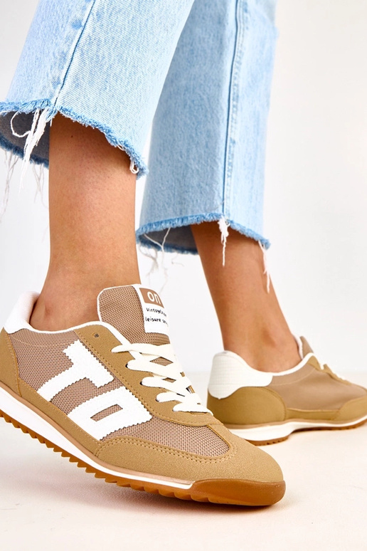 Groene sportschoenen met witte...