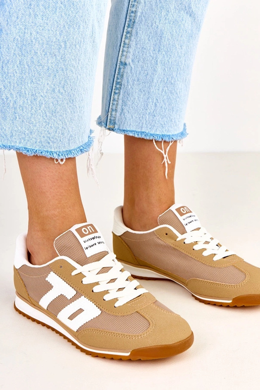 Grüne Sportschuhe mit weißen...