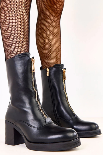 Bottines noires à talon...