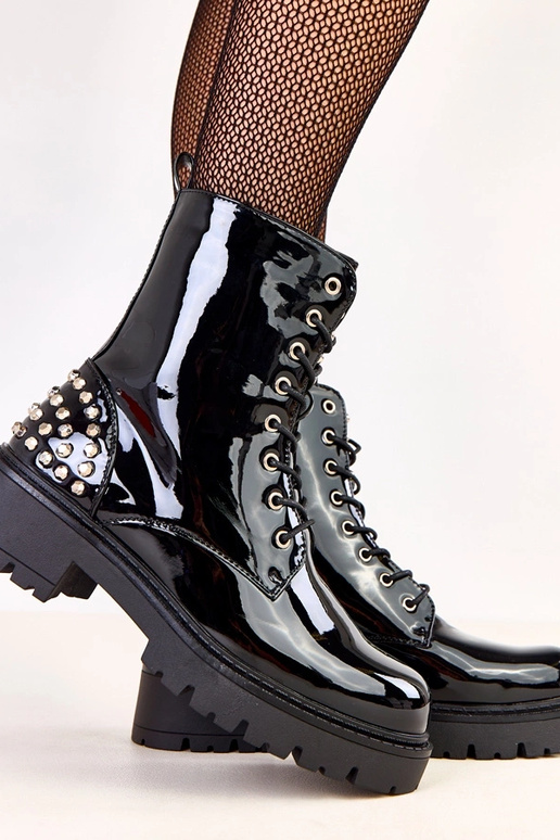 Bottes noires en vernis avec des...