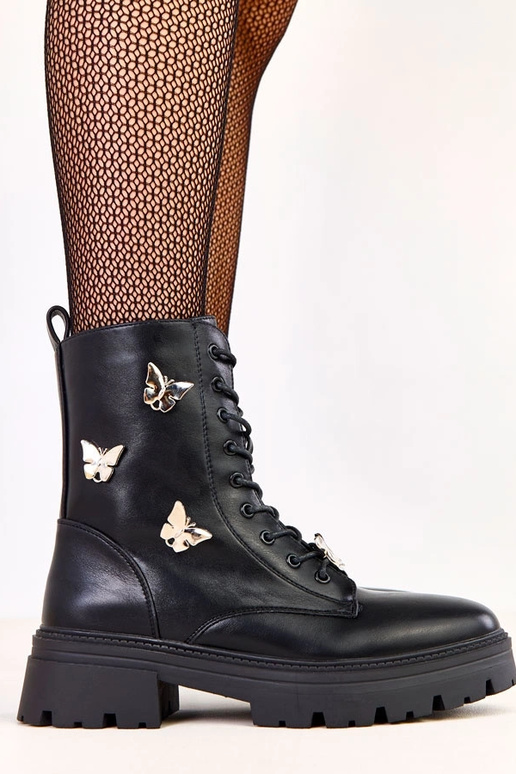 Bottines féminines noires ornées de...