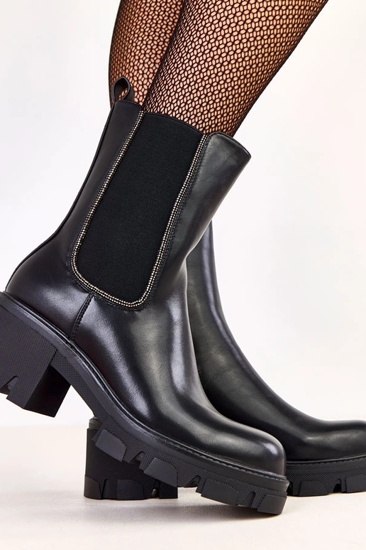 Bottines noires avec élastique et... Bottines noires avec élastique et...