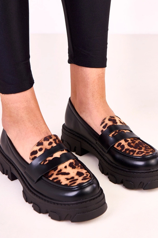 Mocassins noirs avec accent à motif...