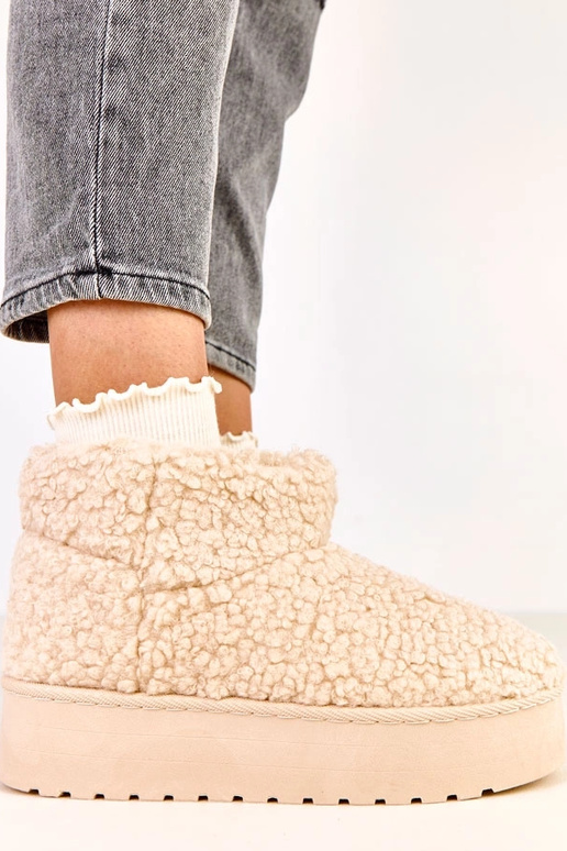 Beige sneeuwlaarzen met schapenvacht...