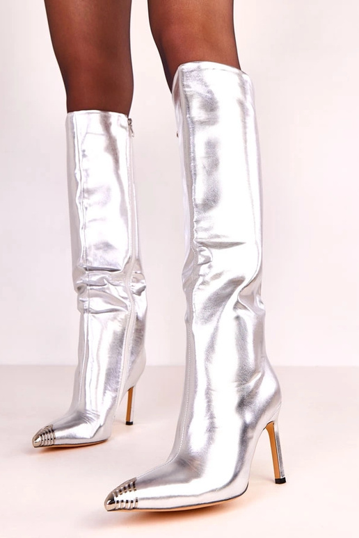 Bottes montantes élégantes argentées... Bottes montantes élégantes argentées...