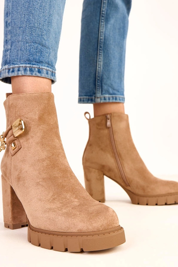 Bottines brunes à talon...