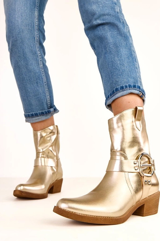 Gouden cowboylaarzen met hak en... Gouden cowboylaarzen met hak en...