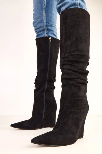 Bottes hautes noires sur...