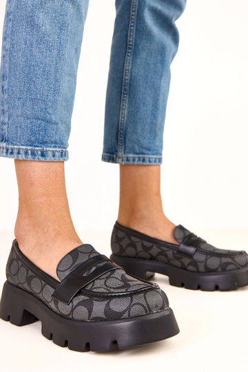 Mocassins noirs à motif...