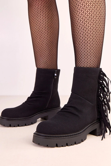 Bottes Silia en cuir noir avec franges sur épaisse semelle