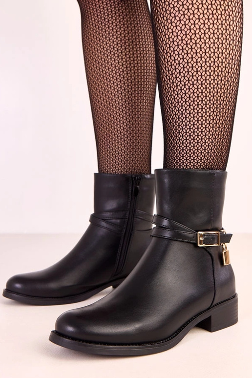 Bottines noires avec boucle et...