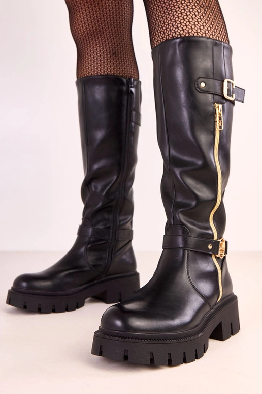 Bottes hautes noires sur plateforme...