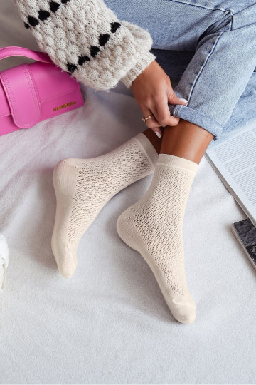 Chaussettes Féminin avec des éléments ajourés couleur ivoire