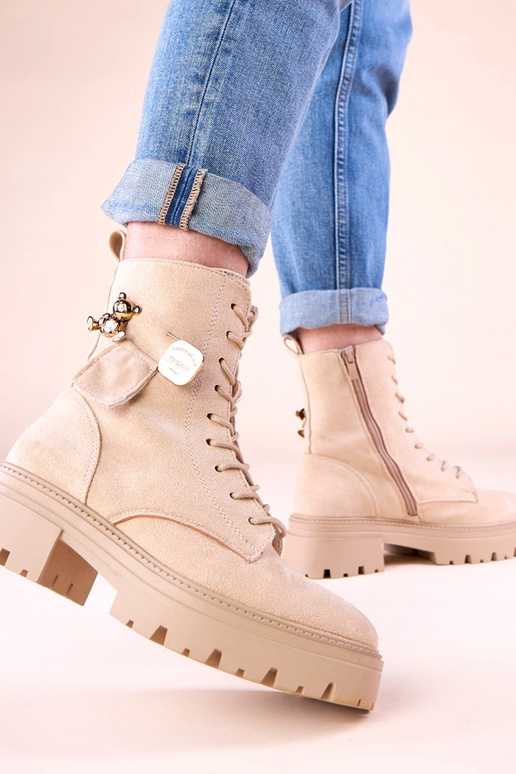 Beige damescargobroek met gouden...