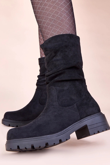 Bottines noires sur...