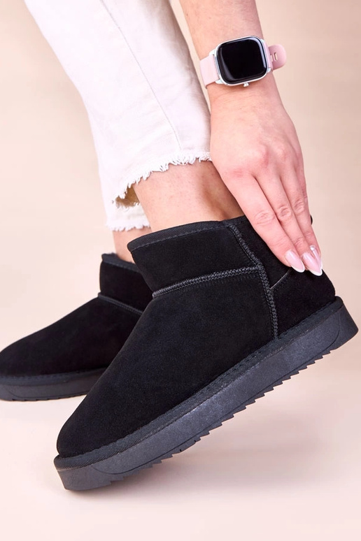 Bottes de neige noires en daim...